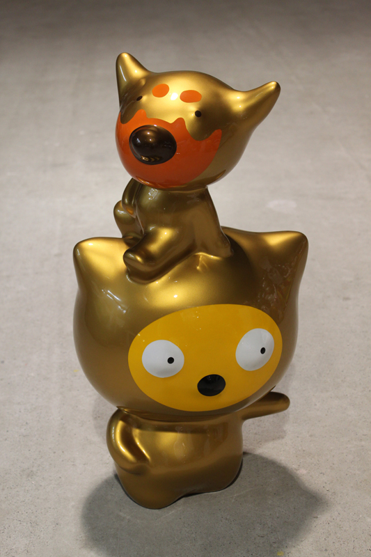 Gold Suki on a Big Head Taehee, 30x24x57cm, car paint on plastic, 2012.JPG